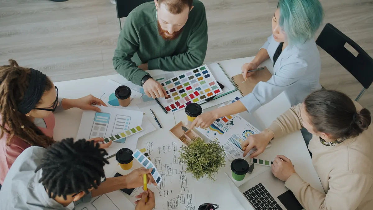 Content brief software: what it is and how teams use it — Creative Team Meeting with Color Palettes