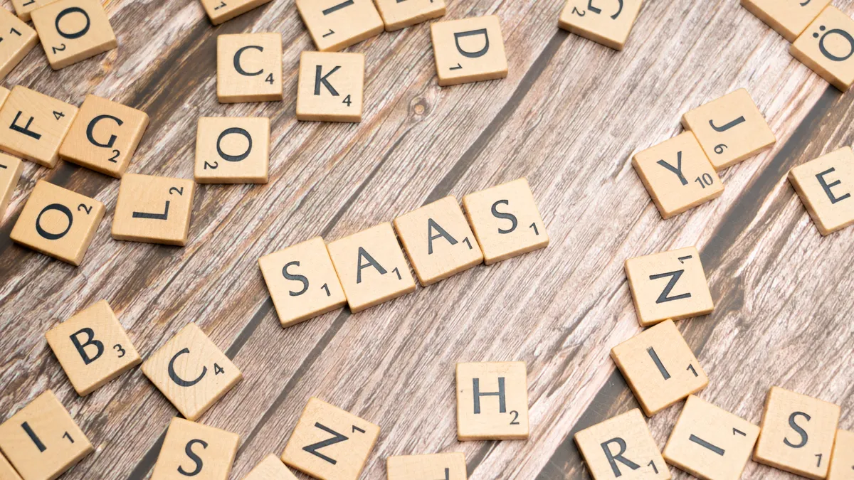 Writing SaaS category hub: workflows, features, and implementation — The Complete Guide Writing SaaS category hub: workflows, features, and implementation — The Complete Guide — Scrabble letters spelling saas